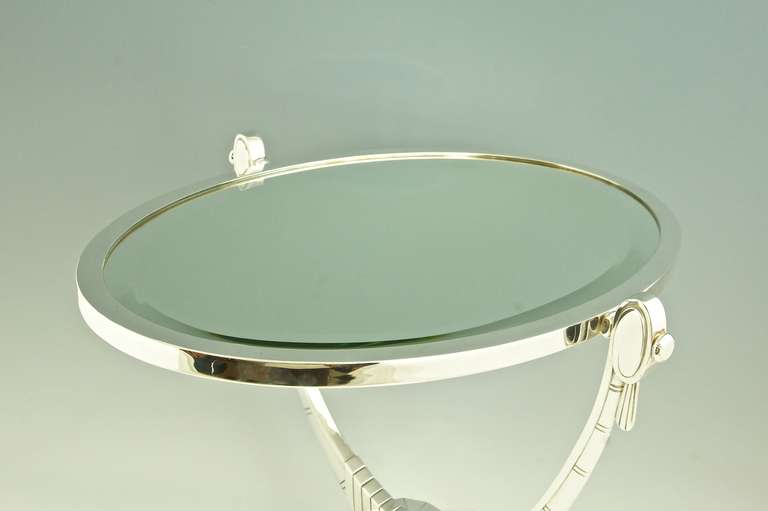 An Oval Art Deco Mirror with Beveled Glass by Atelier Raynaud, France 4