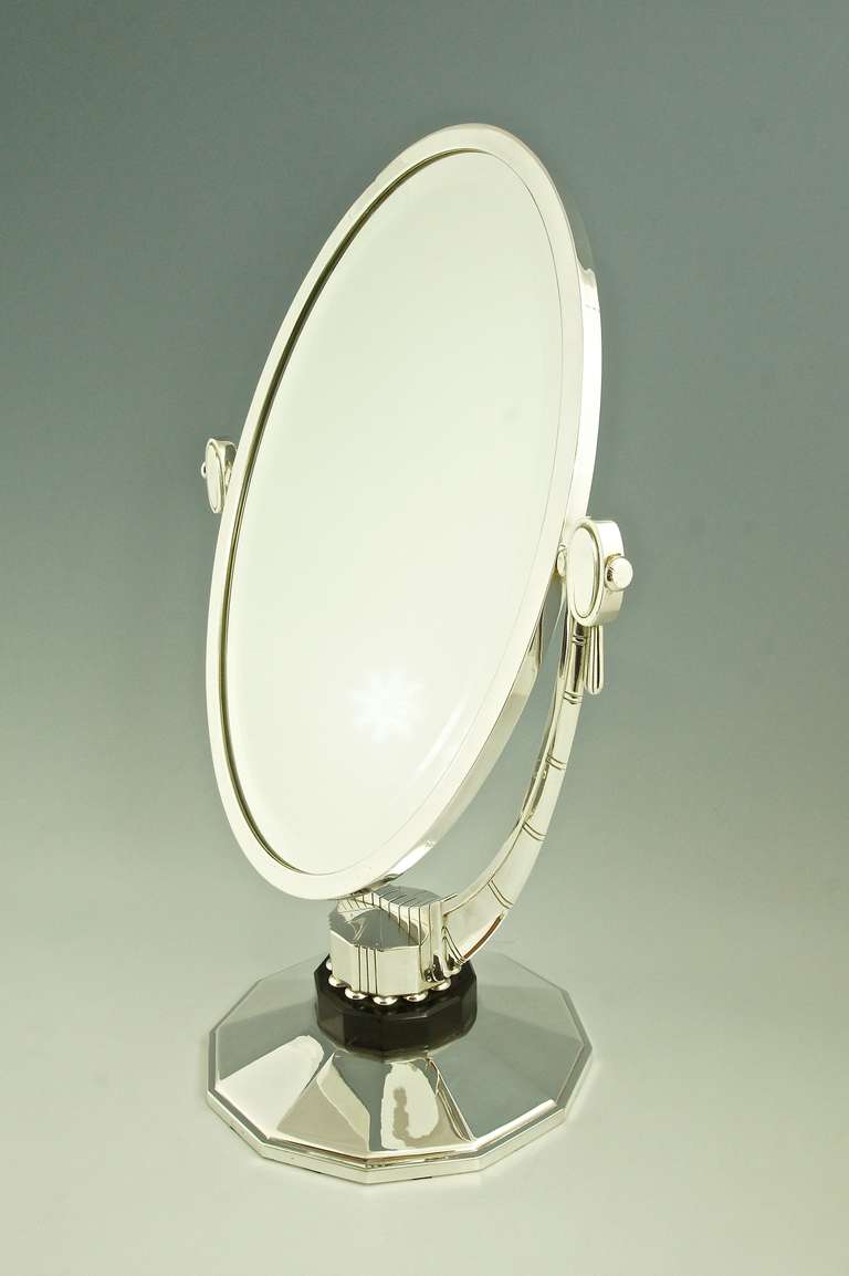 An Oval Art Deco Mirror with Beveled Glass by Atelier Raynaud, France 1