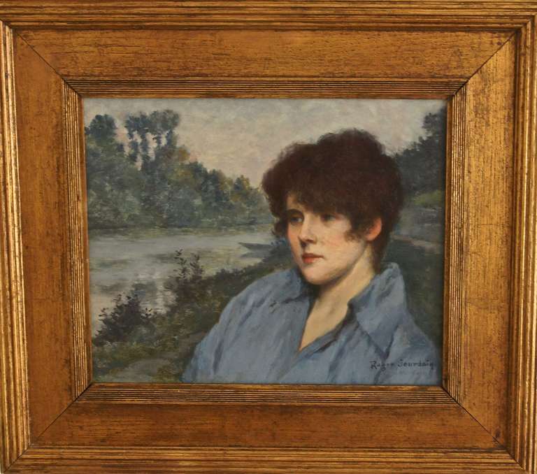 A portrait of Mme. Henriette Roger Jourdain, the wife of the painter, in a landscape. 
By Roger Joseph Jourdain (1845-1918)
She inspired many musicians and painters ( f.e. John Singer Sargent, Besnard, Boldini, etc.) in that period. 

Signature: