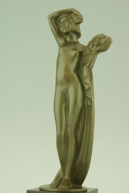 20th Century Art Deco Bronze sculpture of a Nude with Flowers by Zoltan Kovats 1930