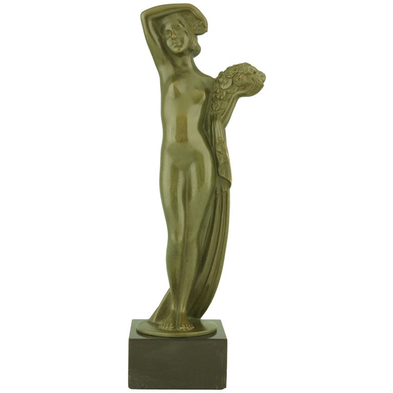 Art Deco Bronze sculpture of a Nude with Flowers by Zoltan Kovats 1930