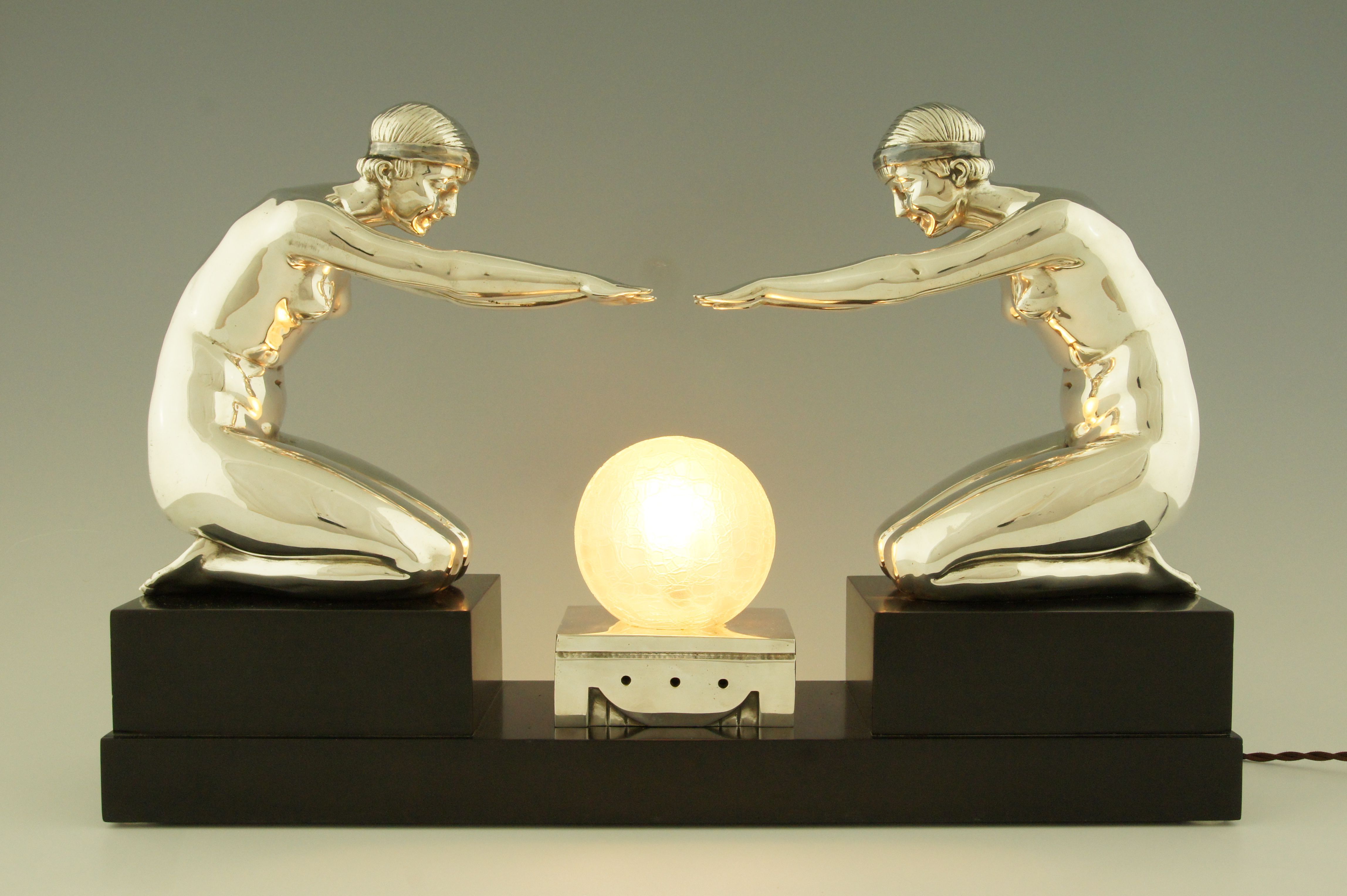 Art Deco silvered bronze lamp with two kneeling nudes by Pierre Lenoir