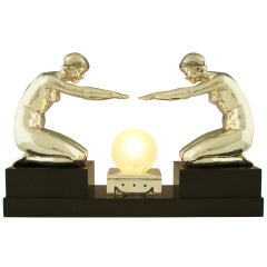 Art Deco silvered bronze lamp with two kneeling nudes by Pierre Lenoir