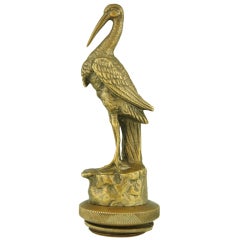 Vintage Art Deco Car Mascot of a Stork Standing on a Rock by Omerth