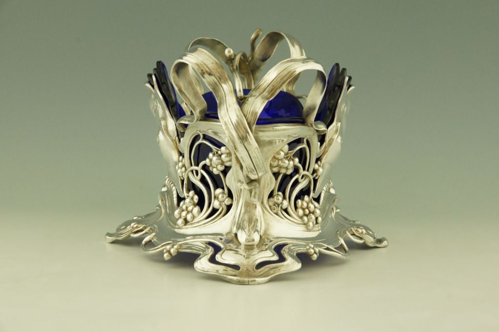 Art Nouveau flower dish with butterflies and blue glass by WMF.