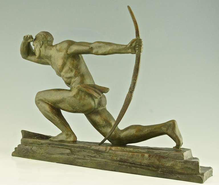 The Archer, a bronze sculpture of a kneeling man holding a bow. 
By Pierre Le Faguays.
Signature:  Le Faguays.
Style: Art deco.
Condition:  Good original condition.
Date: 1930.
Material: Bronze with green patina. 
Origin: France. 
Size:			