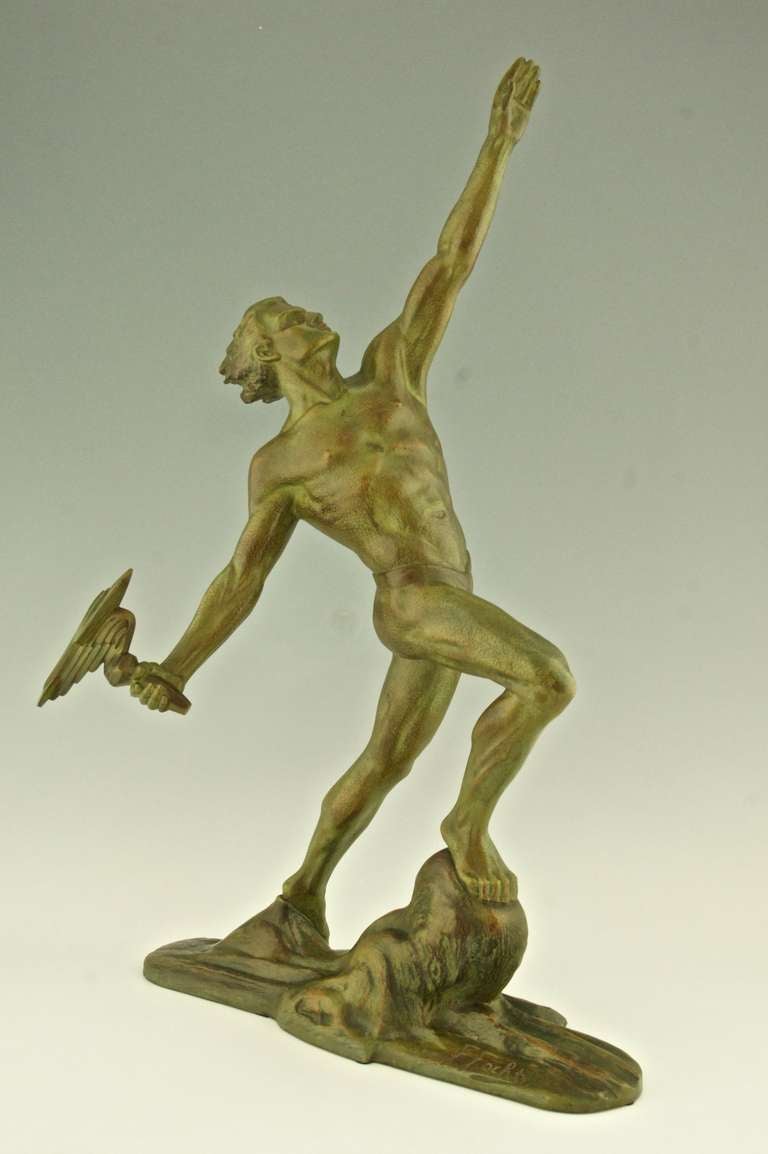 Art Deco bronze of a man in a dynamic pose holding a flaming torch. By Frederic C. Focht. (Born in France in 1879) 
Chardon foundry.
“Dictionnaire des peintres,sculpteurs,dessinateurs et graveurs” by E. Benezit. Gründ. “The dictionary of sculptors