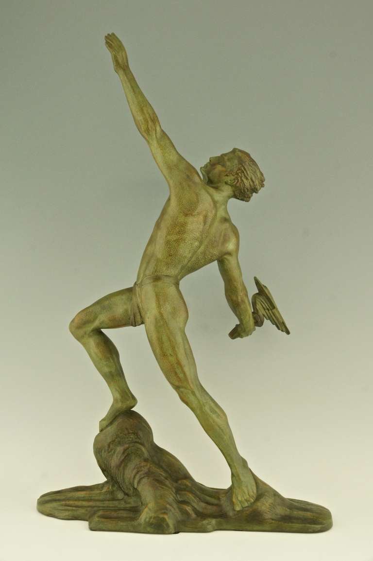 French Art deco bronze of a man with a flaming torch by Frederic Focht