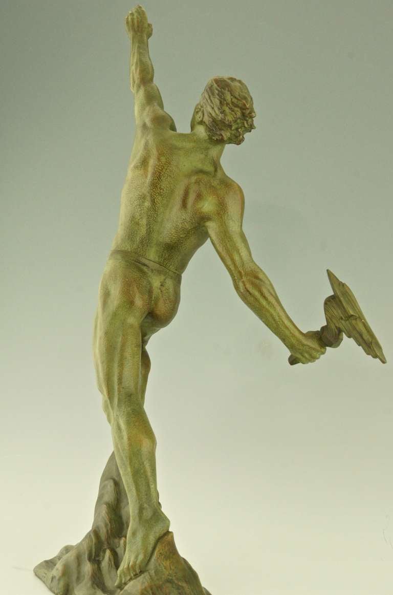 Bronze Art deco bronze of a man with a flaming torch by Frederic Focht