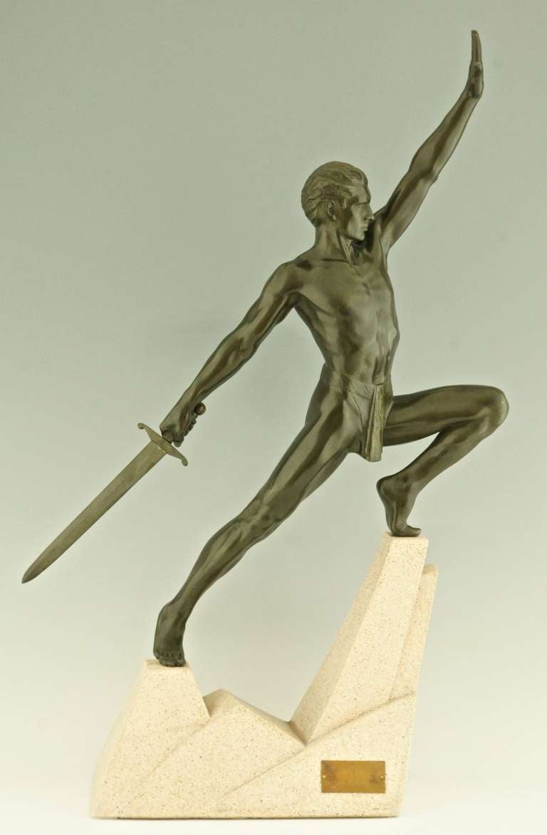 Art Deco sculpture of a sword fighter on a rock by Max Le Verrier, France 1937. 
Unsigned, picture in Max Le Verrier catalogue of 1937.