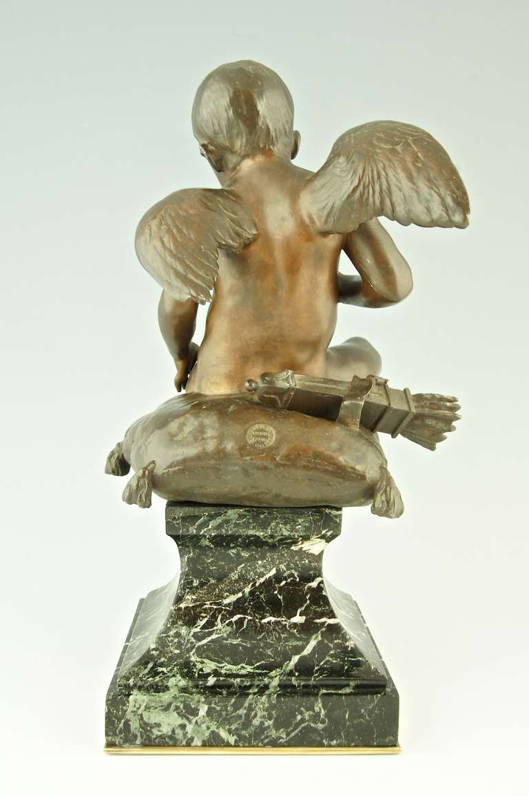 Patinated Antique Bronze Sculpture of a Seated Cupid by Antonin Mercie, Siot Foundry, 1880