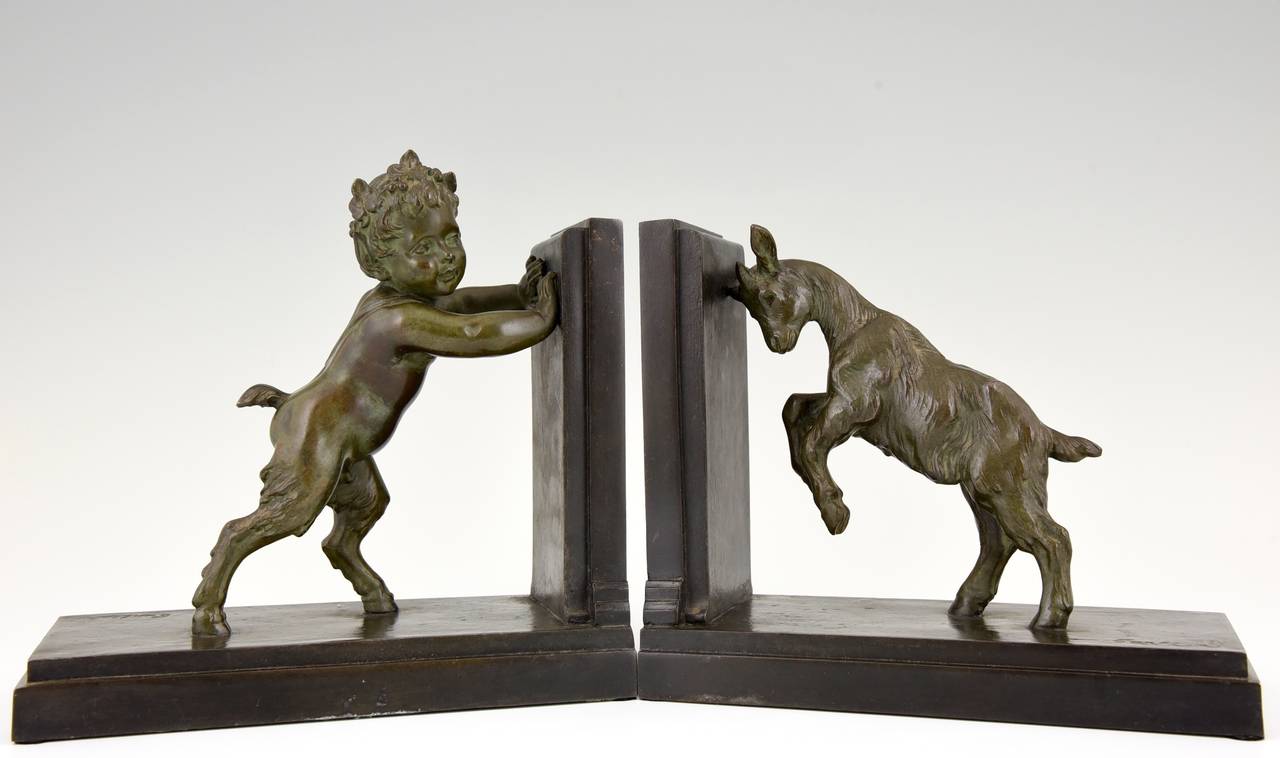 Pair of Art Deco bookends signed Carlier depicting a young satyr and a goat.
By Carlier.
Signature/ Marks: Carlier. Foundry seal Paris France.
Style: Art Deco.
Condition: Good original condition.
Date: circa 1930.
Material: White metal,