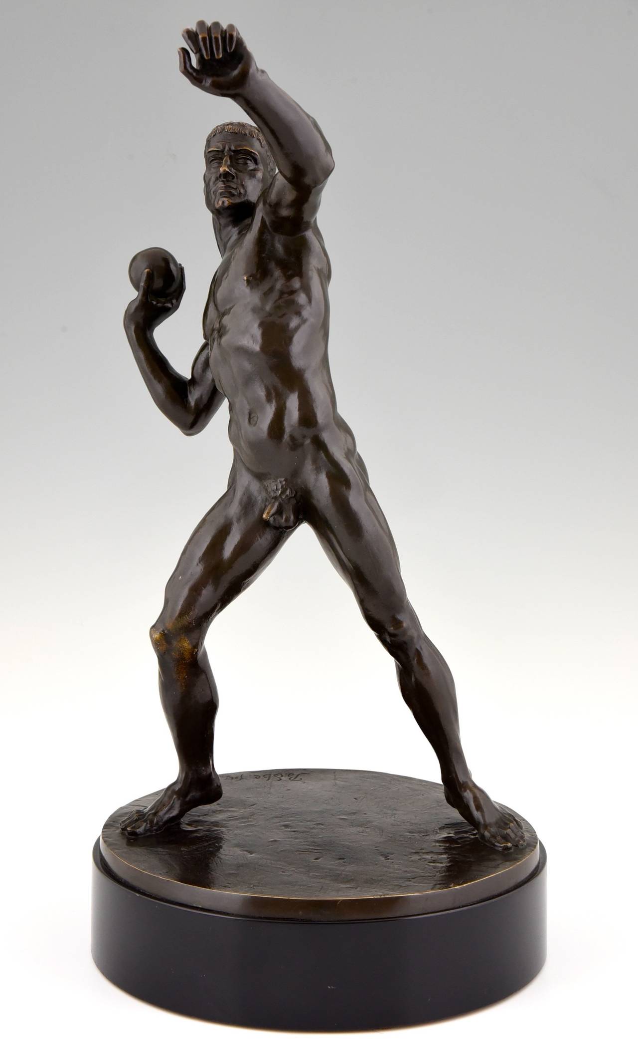 Description:  Antique sculpture of a male nude athlete playing shot put. 
Artist: Burkhart Ebe. (1881 Berlin -1949)
Signature and Marks:  B. Ebe fec. 
Date:  1930.

Material: Bronze on wooden base. 
Origin:  Gemany. 
Size: 
H. 22.8 inch x L.