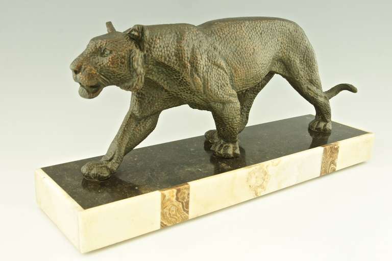 Art Deco sculpture of a walking panther by Rulas.