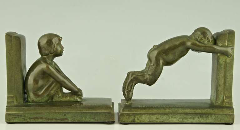 Art Deco styled figures on bookends representing male and female satyr.”¨Reduced version of the ”œMiroir d”™eau” fountains in Paris and Lucerne.
Signed: P. Silvestre, foundry seal, Susse Frères, Paris.   
The bookends are illustrated in Bronzes,
