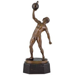 Antique Sculpture of a Male Nude Athlete with dumbbell by Peleschka 1900