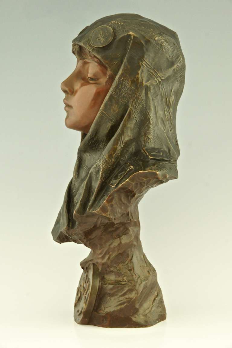 Description:  Dalila, bronze bust of a girl.
By  Emmanuel Villanis (1858-1914)
Signature / Marks:
 E. Villanis. 
Foundry seal 