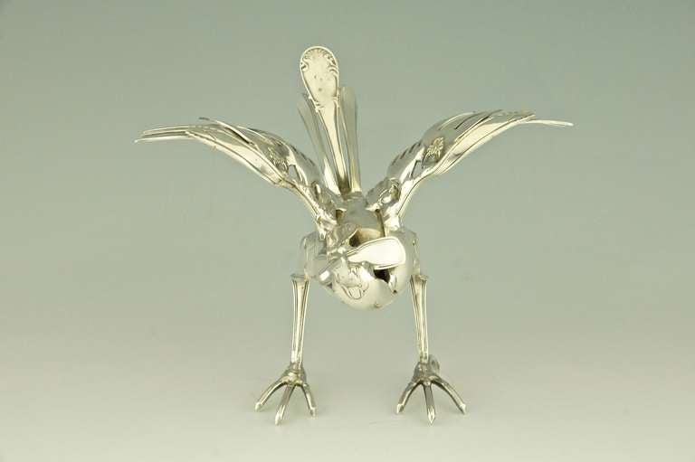 birds made out of silverware