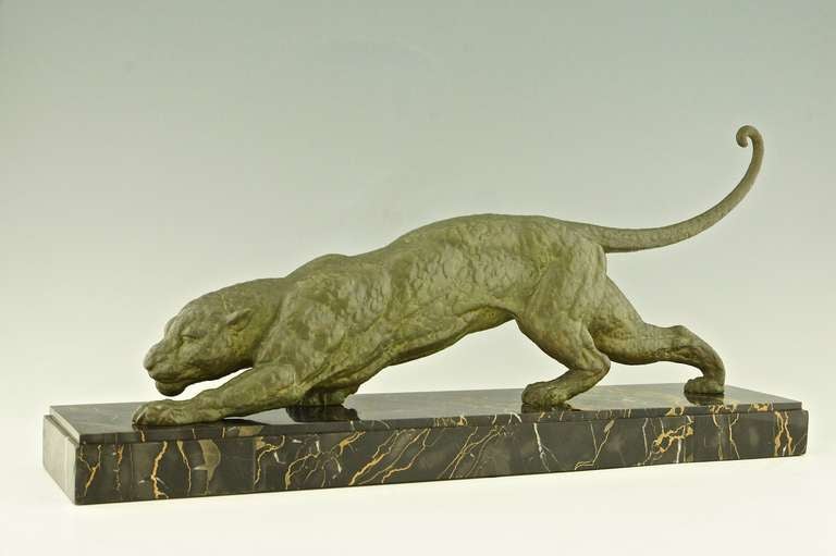 Art Deco panther on a portor marble base.
Signed D. H. Chiparus.

Fedex shipping: $ 195.