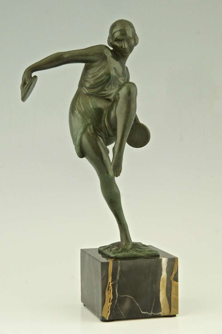 Description: Art deco dancer with cymbals. 
By  Fayral, pseudonym of  Pierre Le Faguays.
Signature / Marks: Fayral. Max Le Verrier foundry mark.

Literature:		
Bronzes, sculptors and founders by H. Berman, Abage.  
Art deco sculpture by Victor