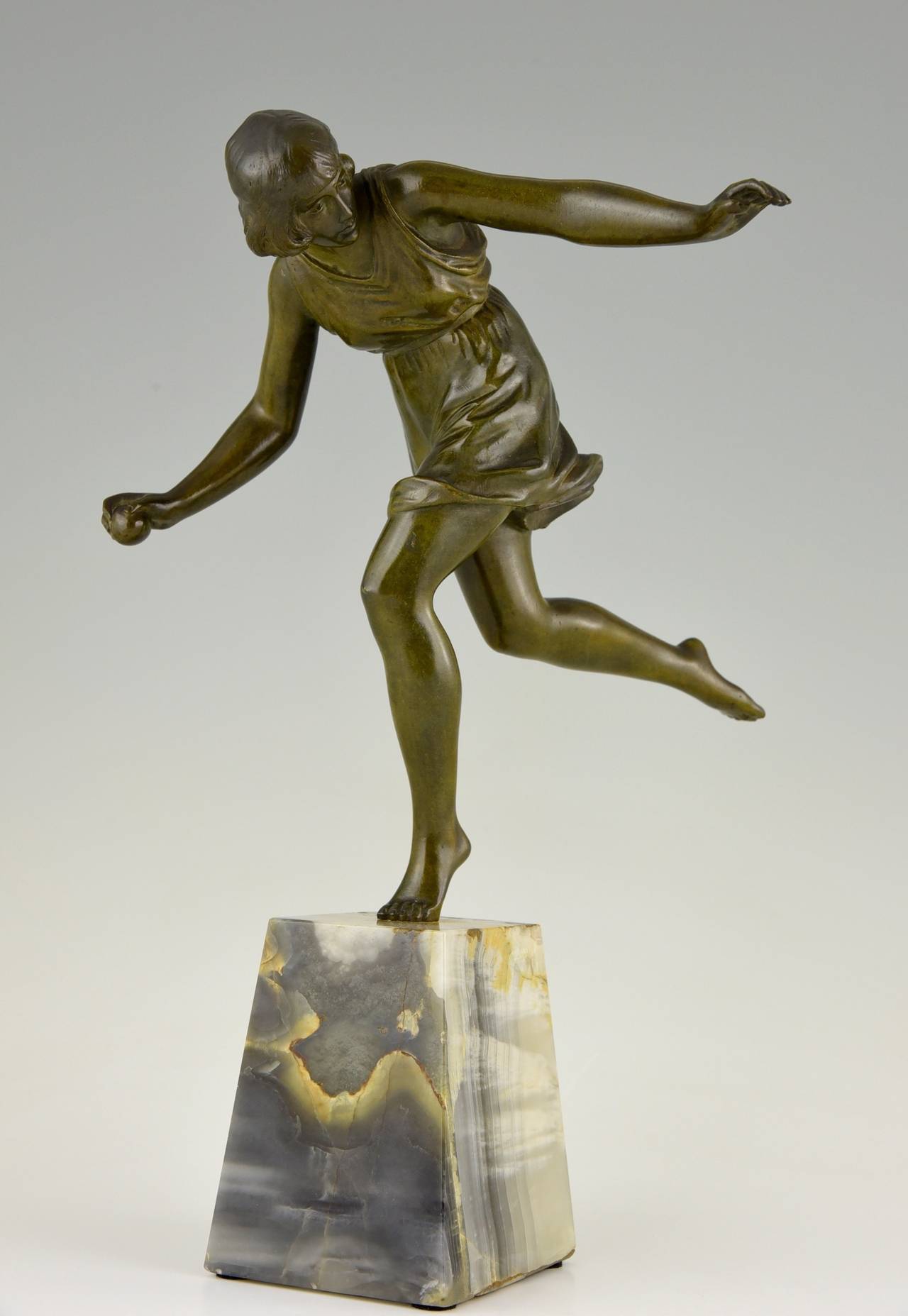 Title:  Atalanta.
Description: A bronze Art Deco figure of a girl throwing a ball on a marble base.
Artist/ Maker: Pierre  Le Faguays, 
Signature/ Marks:  Le Faguays.
Style: Art Deco.
Condition:  Good original condition.
Date: