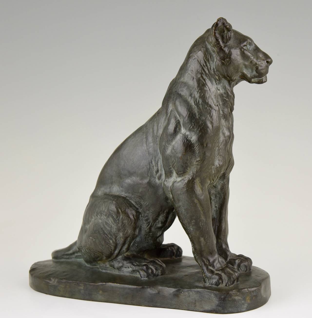 Description:  Bronze of a sitting panther. 
Artist / Maker:  Charles Valton.
Signature / Marks:  C. Valton.

Material:  Bronze with green patina.
Origin:  France. 
Date: 1910.
 
Size: 
H 10.4 inch X H 10.2 inch x W 4.3 inch. 
H 26.5. cm. x