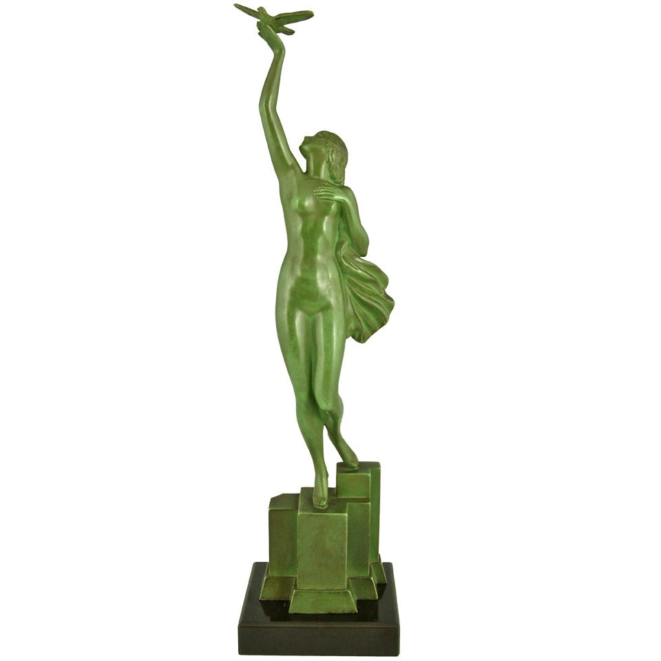 Art Deco sculpture of a nude holding a dove by Fayral, P. Le Faguays, 1930.