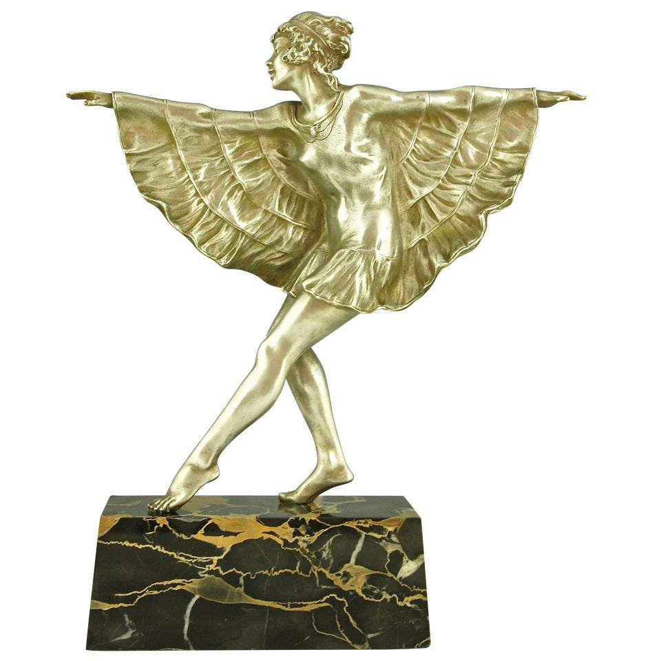 Art Deco silvered bronze dancer with butterfly dress by Marcel Bouraine.