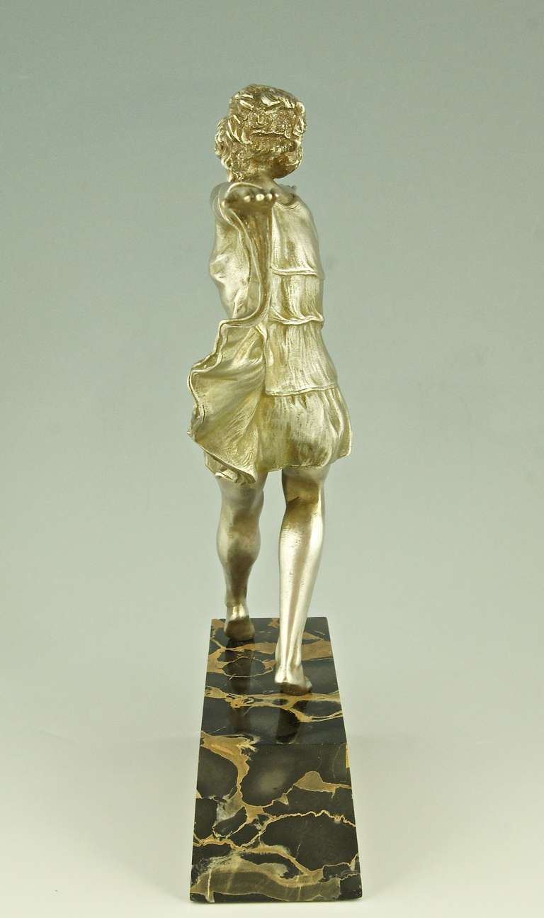 20th Century Art Deco silvered bronze dancer with butterfly dress by Marcel Bouraine.