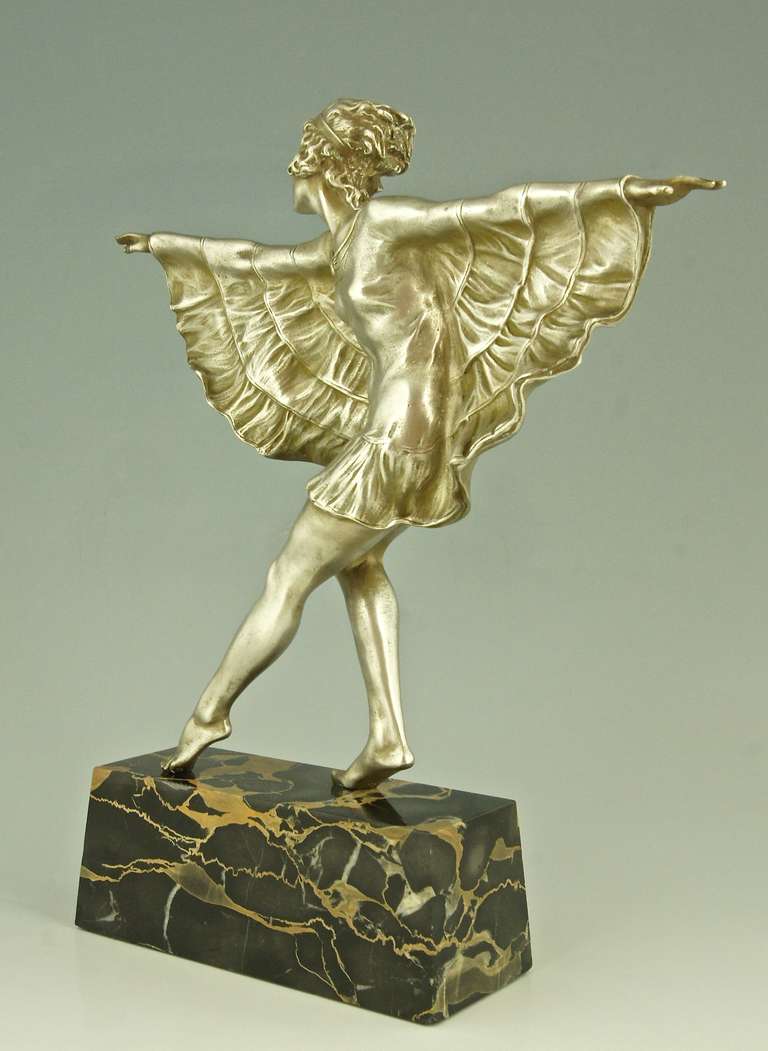 Bronze Art Deco silvered bronze dancer with butterfly dress by Marcel Bouraine.