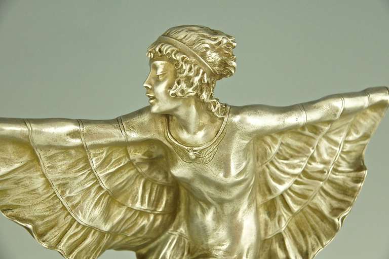 Art Deco silvered bronze dancer with butterfly dress by Marcel Bouraine. 3