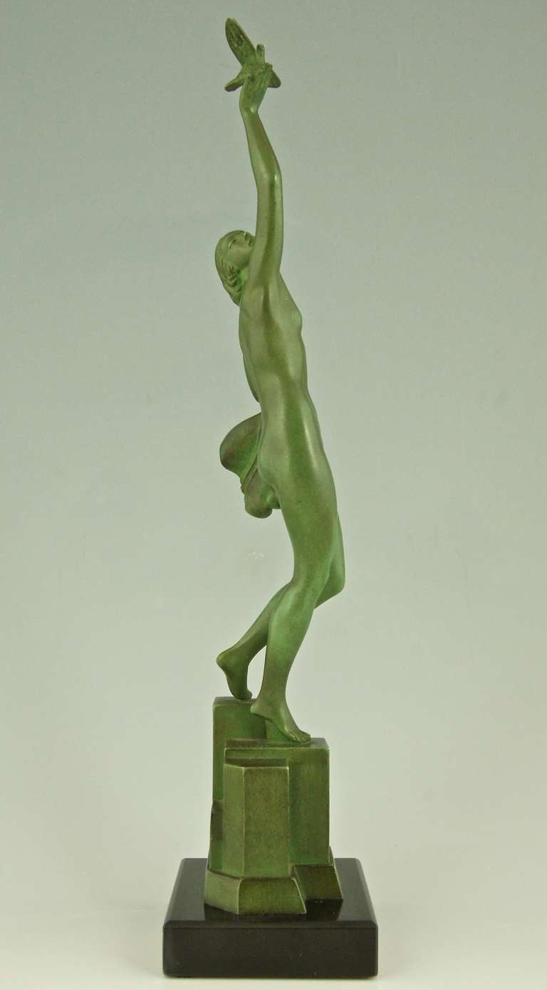 French Art Deco sculpture of a nude holding a dove by Fayral, P. Le Faguays, 1930.