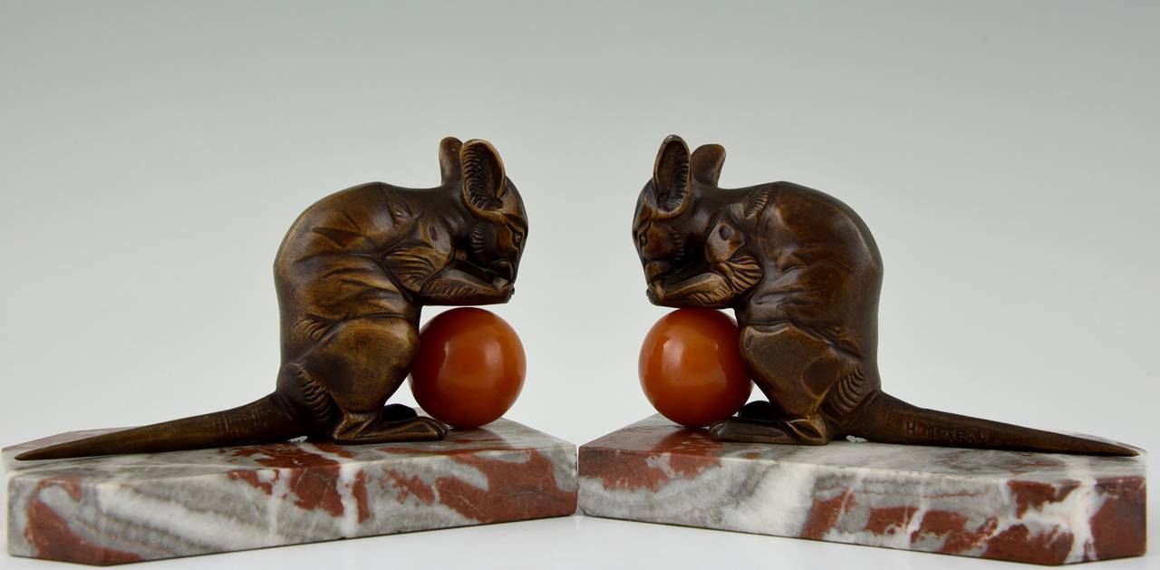 Description:  Art Deco mouse bookends.
Artist/Maker: Hippolyte Moreau. 
Signature / Marks:  H. Moreau. 
Style:  Art Deco. 
Date:  1930.
Material: Patinated metal.  Bakelite ball. Marble bases.
Origin:  France. 
Size of one:  
 H. 4.1 inch x