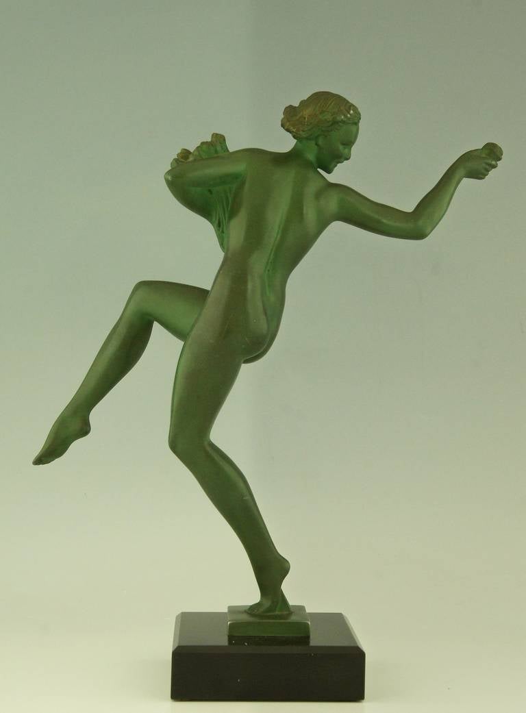 French Art Deco sculpture Dancing Nude with Flowers by Fayral, Pierre Le Faguays, 1930