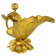 An Art Nouveau gilt bronze flower vase by Coutheillas.