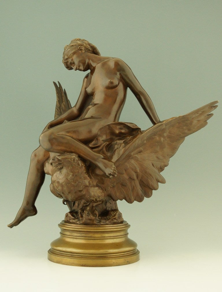 Hebe and the eagle of Jupiter.
In Greek and Roman mythology, Hebe, the daughter of Jupiter and Juno was the goddess of youth. 
This work is signed by Jules Pierre Roulleau ( 1855-1895) and has the foundry seal of Thiebaut Frères. Paris (1885-1894)