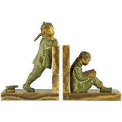 Art Deco bronze bookends of Chinese students by M. White.
