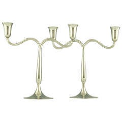 An elegant pair of silvered bronze Hagenauer candelabra.