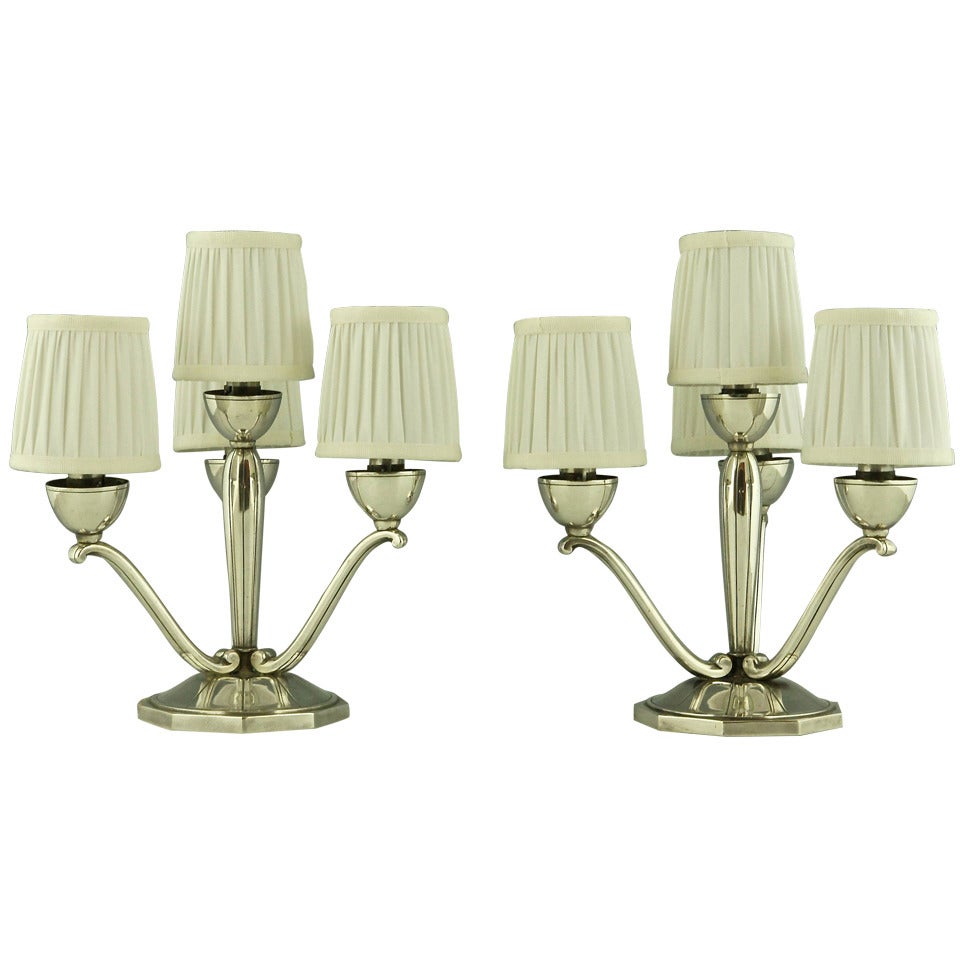 A pair of French Art Deco silvered bronze table lamps by Berger 1930
