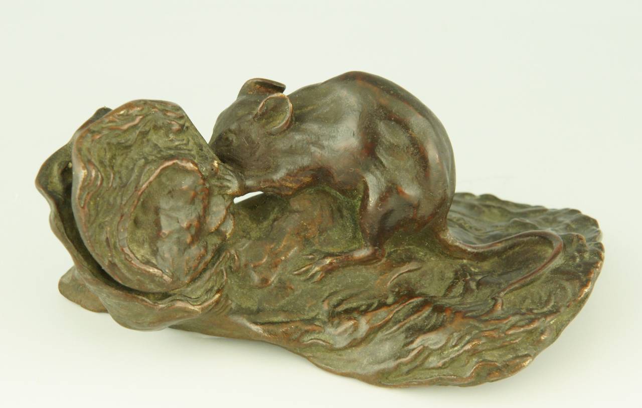 Antique bronze sculpture of a mouse with an oyster shell. 
by Alfred J Foretay. 
Signature:  A. Foretay.
Style:  Romantic.
Date:  circa 1890.

Material:  Bronze with dark brown patina. 
Origin:  France.
Size: 
H. 2.4 inch x L. 4.9 inch x W.