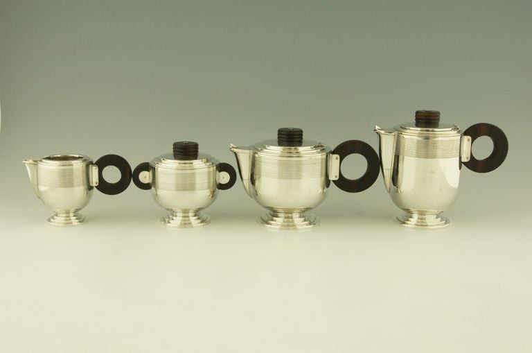 Mid-20th Century Art Deco tea and coffee set by Roux Marquiand.