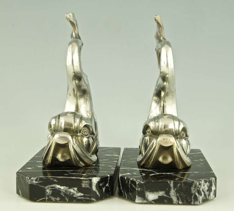 Art Deco fish bookends signed by  Franjou. 

Size of one:			   
H. 6.1 inch x 4.7 inch x W 3.1 inch
H. 15.6 cm x L. 12 cm. x W 8 cm.