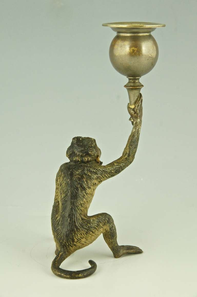 Vienna bronze of a monkey with candlestick holder. at 1stdibs
