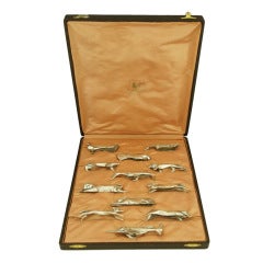 A set of 12 Art Deco animal knife rests by Sandoz for Gallia.
