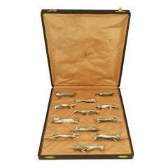 A set of 12 Art Deco animal knife rests by Sandoz for Gallia.