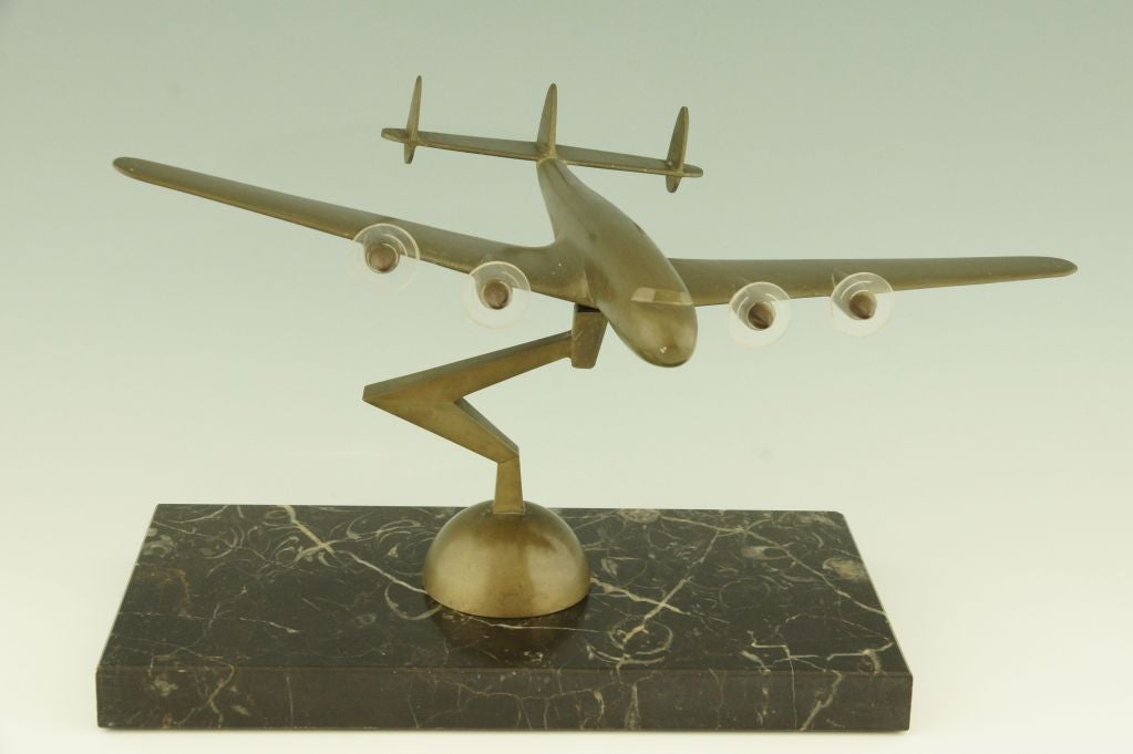 A large bronze desk model of the famous WWII / 1950's airplane The Constellation.