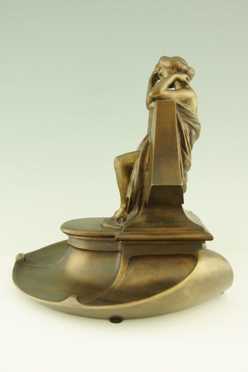 A bronze inkwell with lady sitting on a throne by Max Blondat (1879-1926)

This bronze is illustrated in 
“Bronzes, sculptors and founders” by H. Berman, Abage. nr. 1765 and on page 96 of
“The Paris salons 1895-1914” Alistar Duncan. Published by