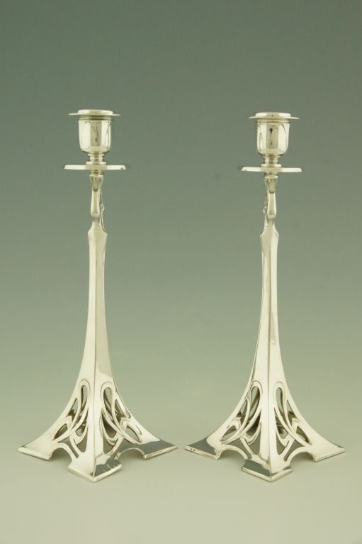 Fedex shipping; $ 165.

A pair of candlesticks with floral design.

WMF, Württembergische Metallwaren Fabrik.

WMF mark, 0/1, as, B.

A picture of this model is shown on page 114 of the book
”Art nouveau domestic metalwork from