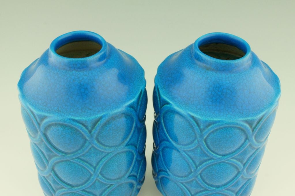 A pair of Art Deco turquoise crackle vases by Boch Frères. 4