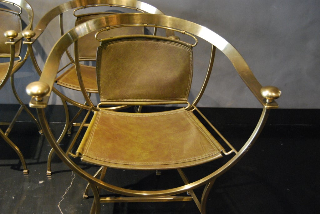 Brass BRASS AND DARK GREEN LEATHER CHAIRS